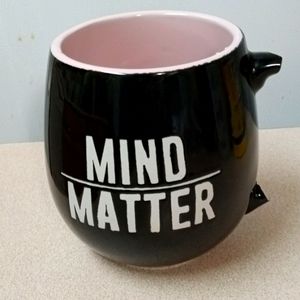 Mind over matter coffee cup with a broken handle